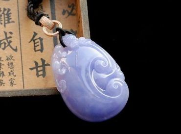 高档紫罗兰翡翠价值能达多少   染色紫罗兰翡翠长什么样