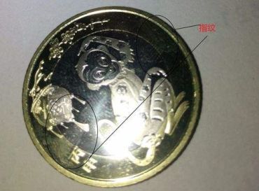 教你怎样去除纪念币表面的指纹印？