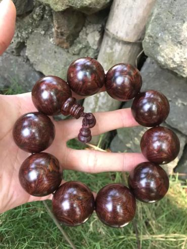 缅甸花梨木手串怎么盘   黄花梨手串包浆效果图