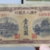 第一版人民币壹佰圆黄色北海桥 100元黄色北海桥价格值多少钱