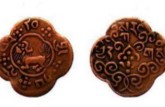 西藏四瓣卡冈铜币发行背景 收藏价值