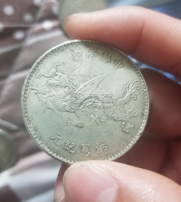 银元的标准厚度是多少  一般重量多少才算正常