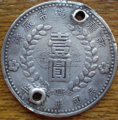 新疆1949银元空心版  新疆银元市场价高吗
