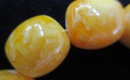 蜜蜡流动纹是天然的吗  假蜜蜡纹理