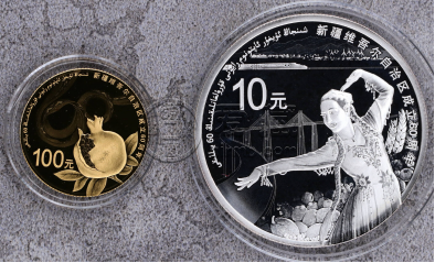 2015年新疆自治区成立60周年金银币价格  新疆成立六十周年金银币值多少钱