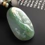糯冰种黄加绿朝拜 翡翠吊坠 尺寸63-36-12毫米