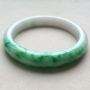 冰种飘花翡翠手镯 缅甸天然翡翠手镯  尺寸：56.8*10.6*7.8mm