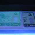 如何鉴别1990年2元绿幽灵纸币真假？